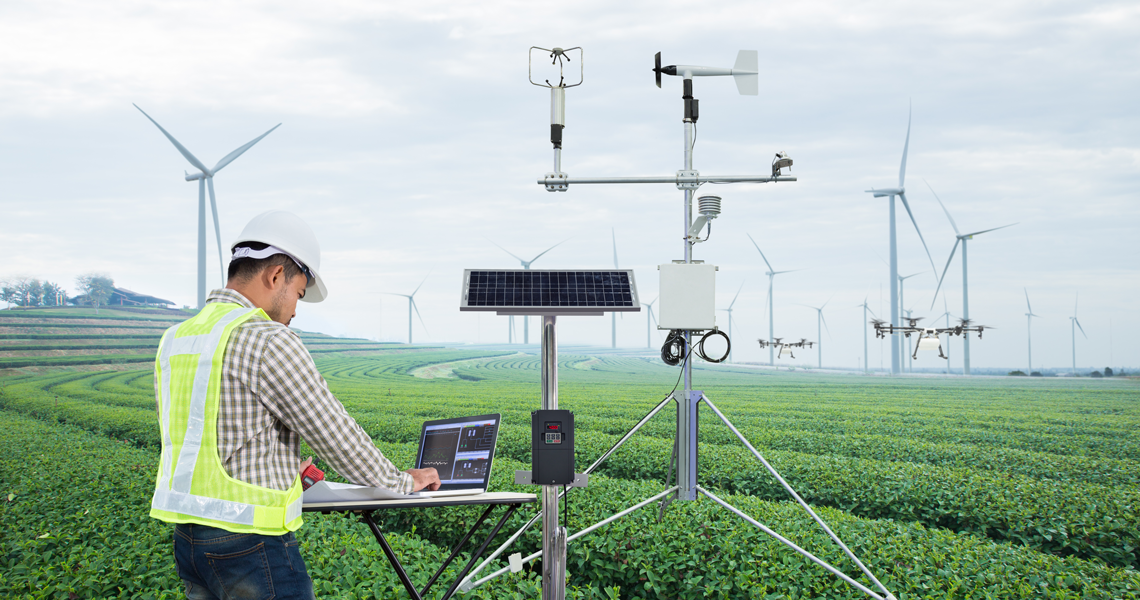 Engineer using tablet computer collect data with meteorological instrument. M2020/Shutterstock.com
