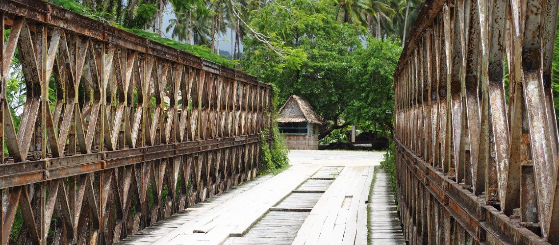 A modular bridge leads to a house in Solomon islands to offer an opportunity to increase climate resilience and safety for rural communities